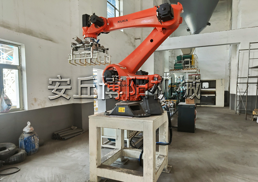 粉煤灰自動碼垛機(jī)器人 自動碼垛機(jī)的工作步驟和特點